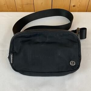 Lululemon Everywhere Belt Bag - Black, about 7 x 5 inches